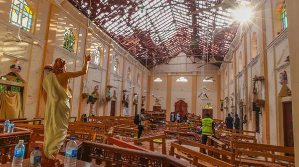 Aftermath of the 2019 Easter Sunday bombings at St Anthonys Shrine in Colombo Sri Lanka showing blast debris and emergency response